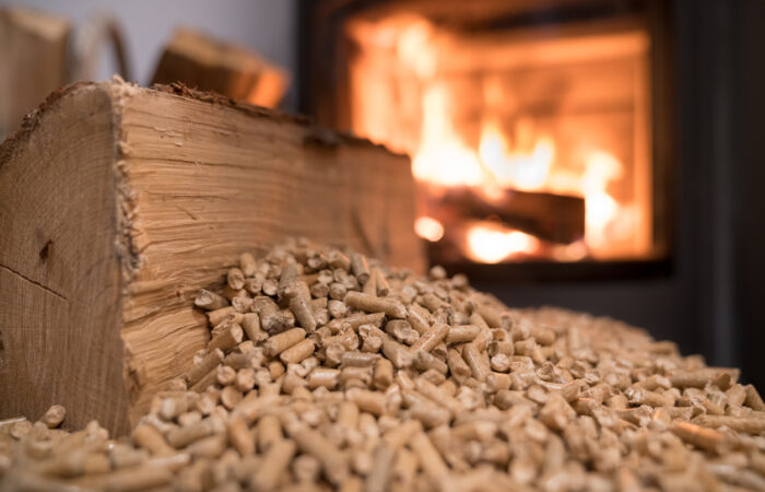 Wood stove heating with in foreground wood pellets - economical heating system concept